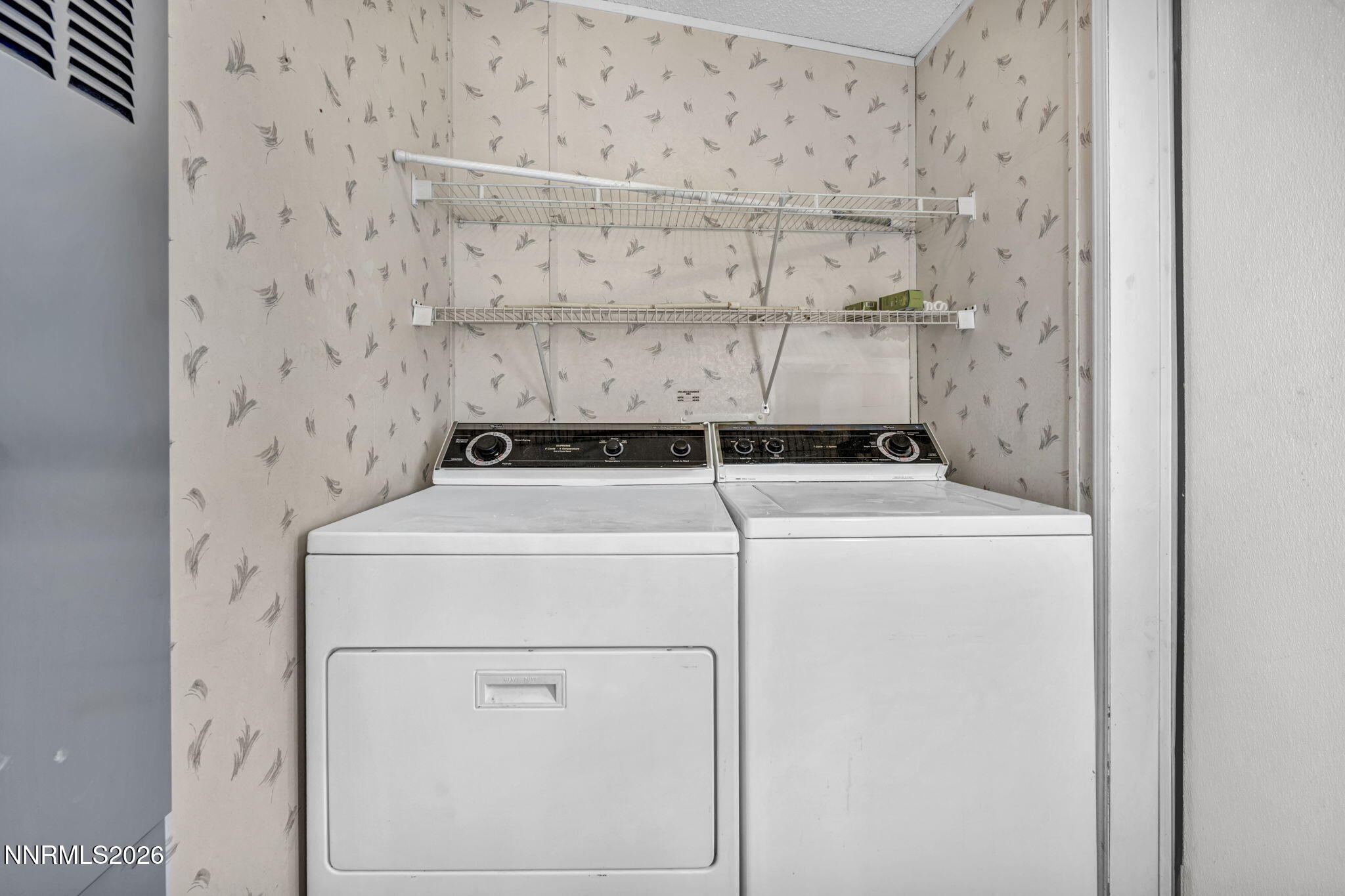 5107 Leon Drive Sun Valley, NV 89433 - Photo 27 of 43 a utility room with dryer and washer