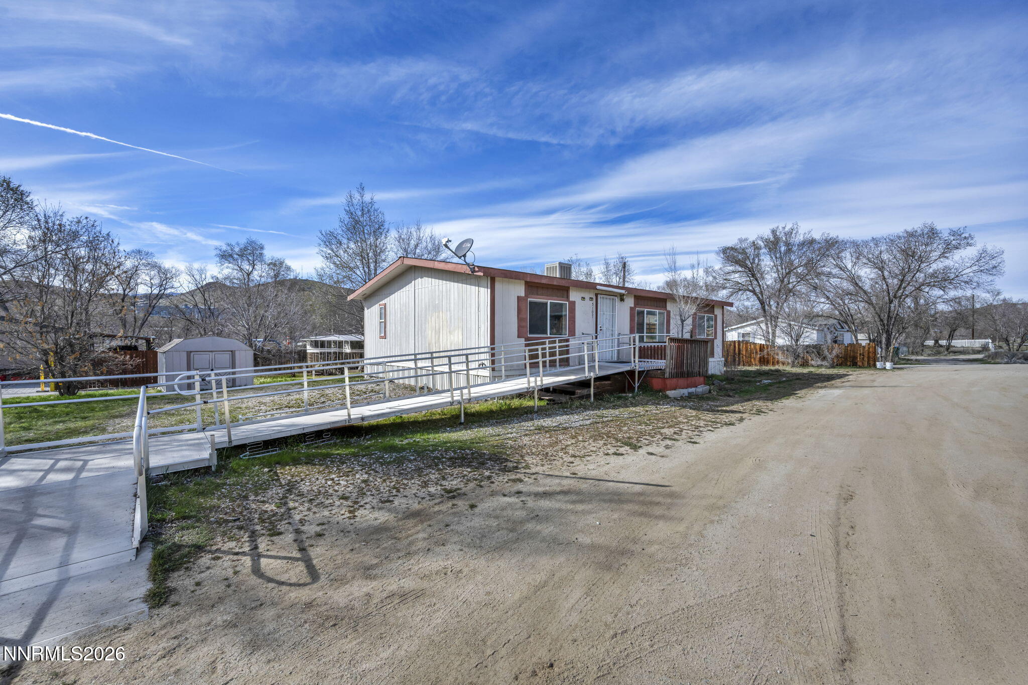5107 Leon Drive Sun Valley, NV 89433 - Photo 35 of 43 a view of a house with a yard