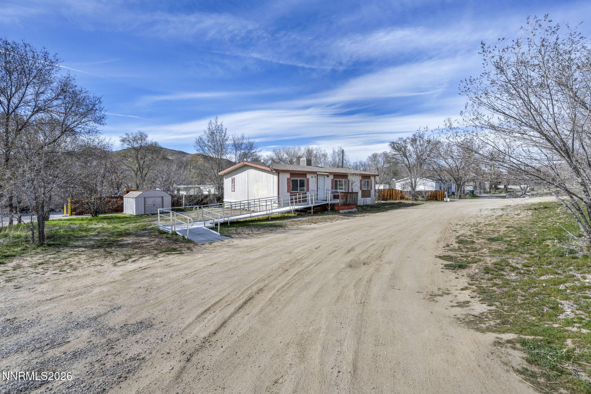 5107 Leon Drive Sun Valley, NV 89433 - Photo 36 of 43 a view of big yard with large trees