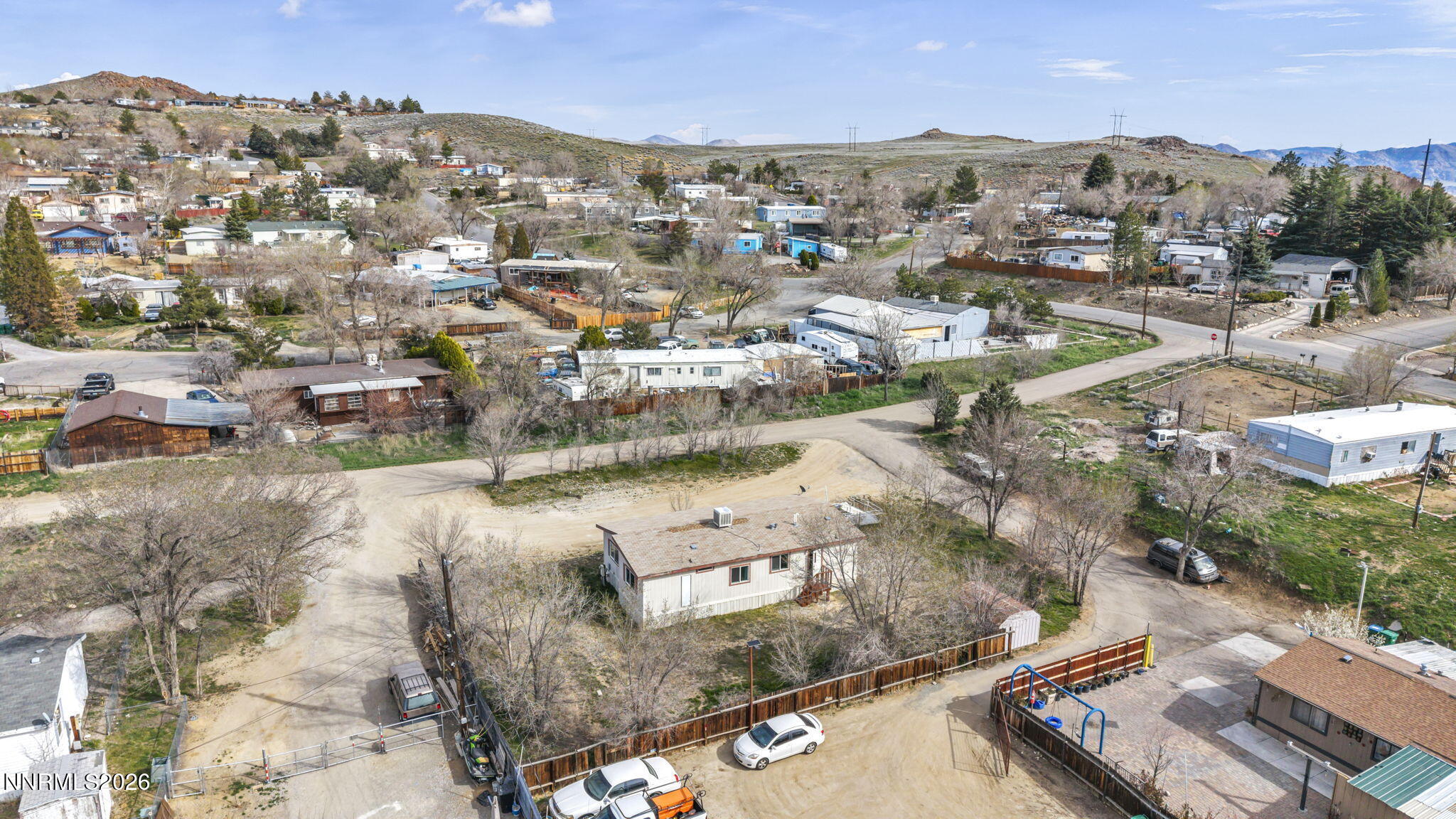 5107 Leon Drive Sun Valley, NV 89433 - Photo 39 of 43 an aerial view of residential houses with outdoor space and river