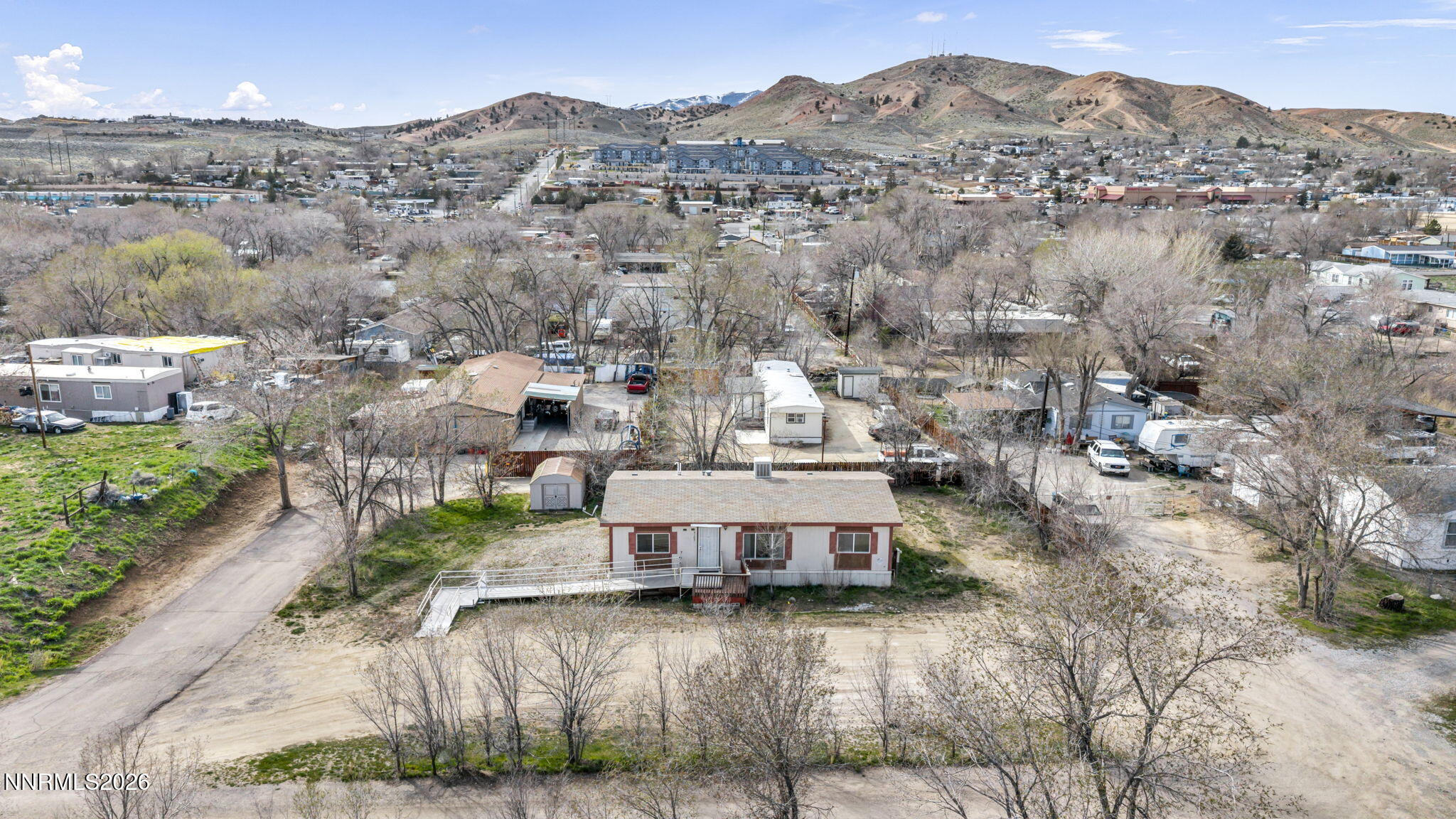 5107 Leon Drive Sun Valley, NV 89433 - Photo 42 of 43 an aerial view of residential house and sandy dunes