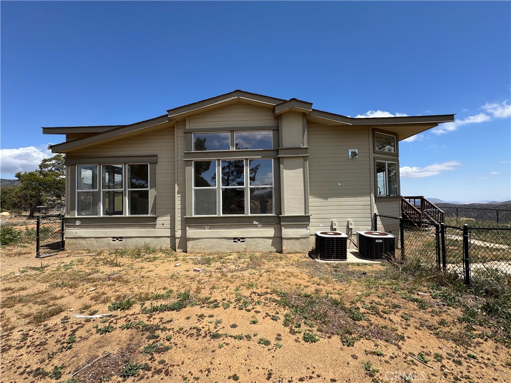 61225 High Country Trail Anza, CA 92539 - Photo 28 of 34 a front view of a house with a yard
