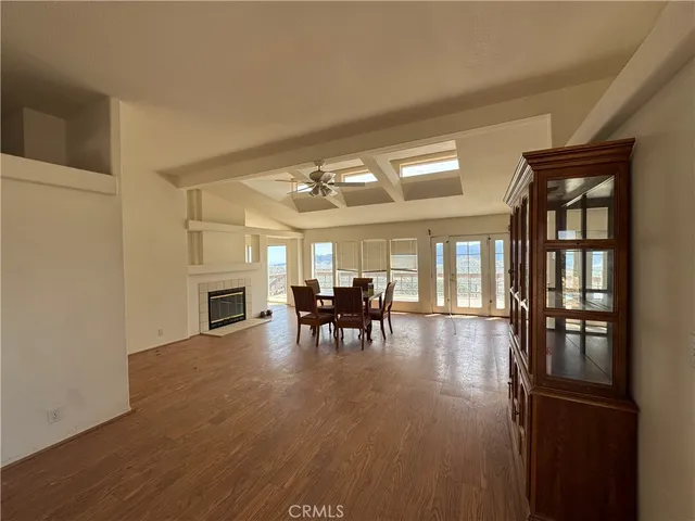 a view of dining room with furniture and chandelier