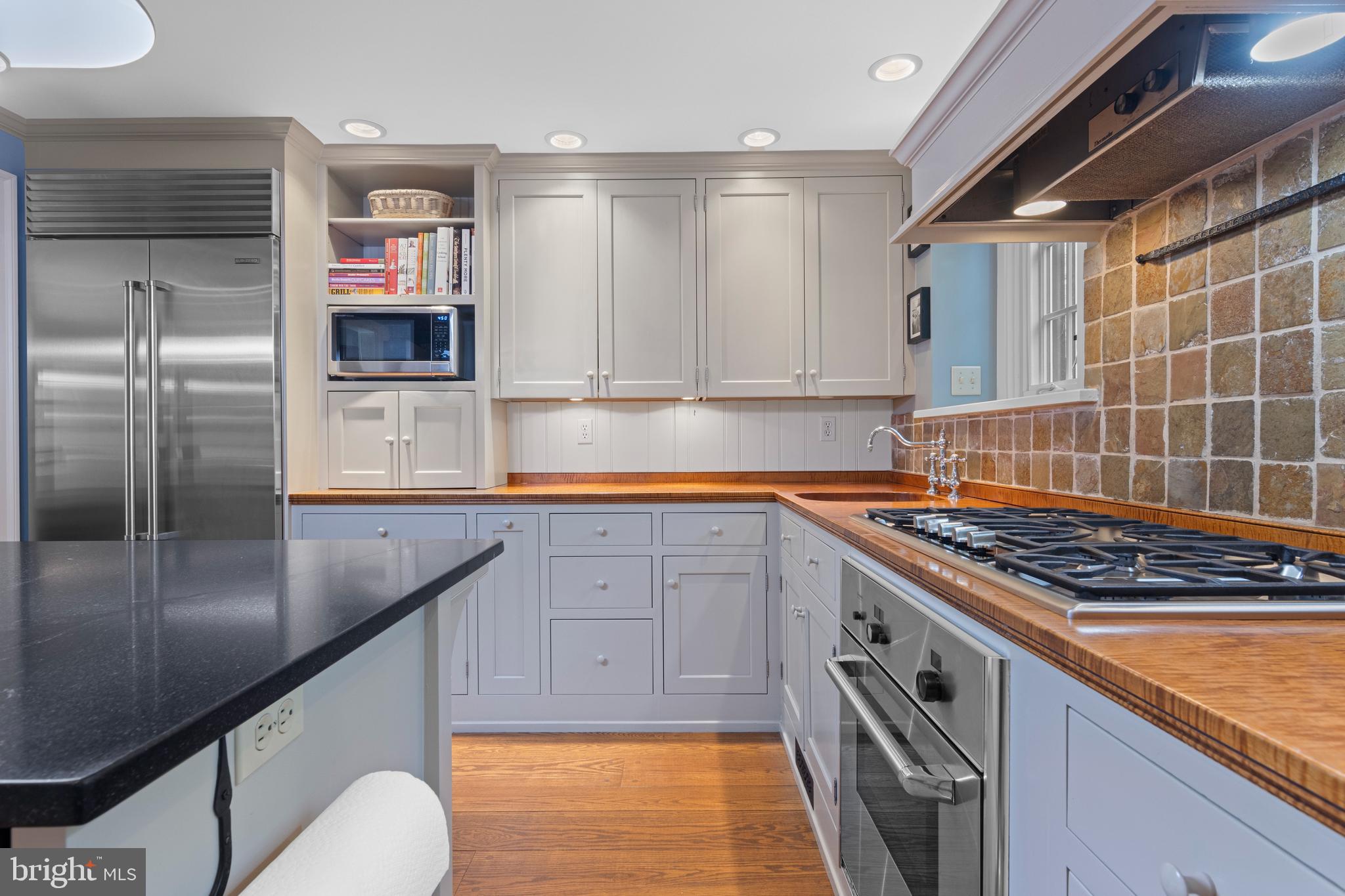 126 Anton Road Wynnewood, PA 19096 - Photo 19 of 52 Gas cooking with exhaust hood
