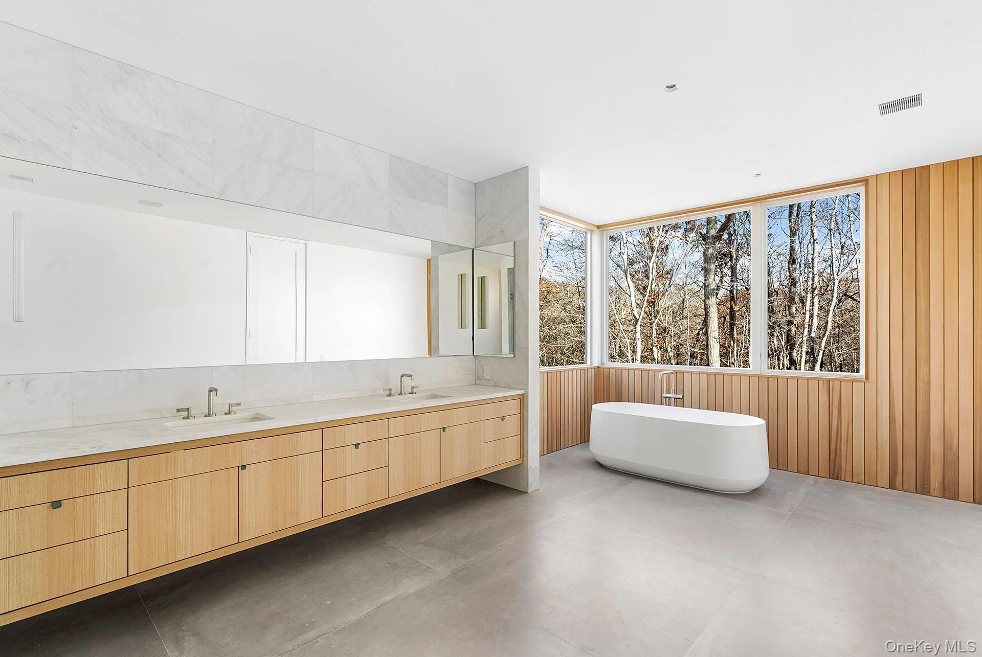 16 Arbor Path Amagansett, NY 11930 - Photo 8 of 10 a large white bed in a room