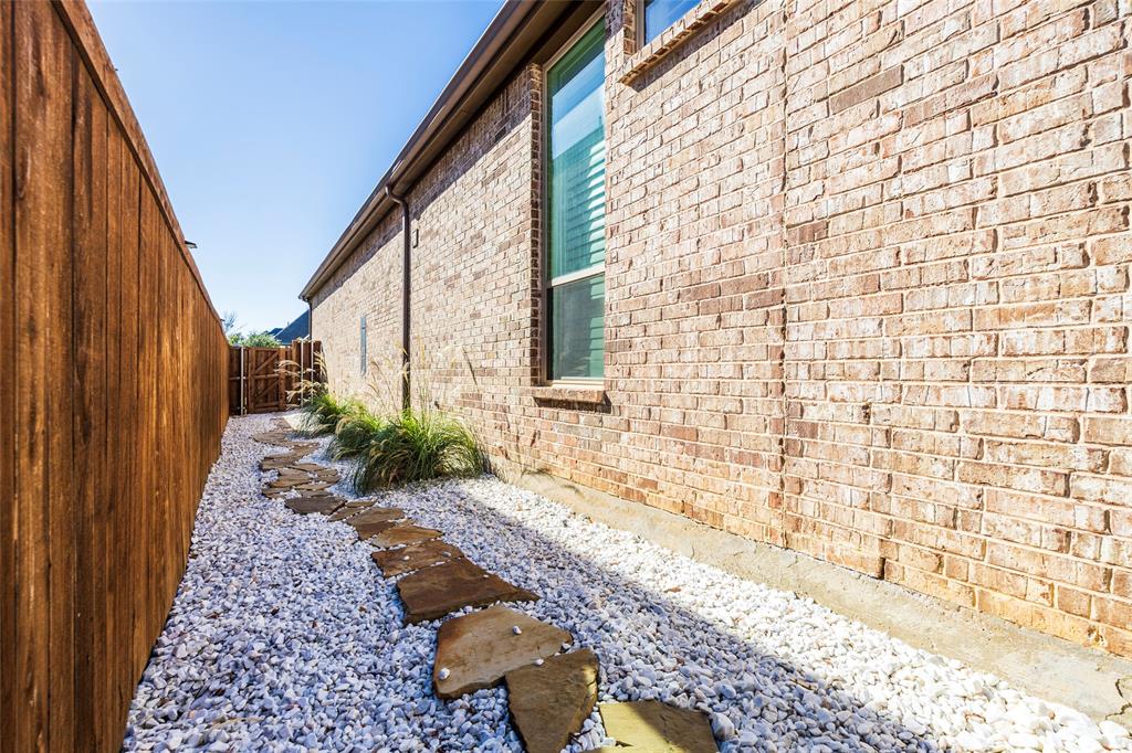 1650 Oakcrest Drive Prosper, TX 75078 - Photo 36 of 40 View of side of home with brick siding