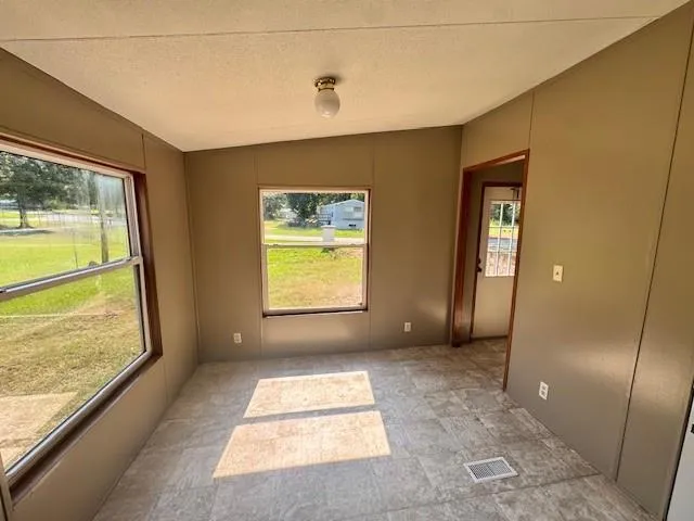 a kitchen with stainless steel appliances granite countertop a sink counter tops and a stove