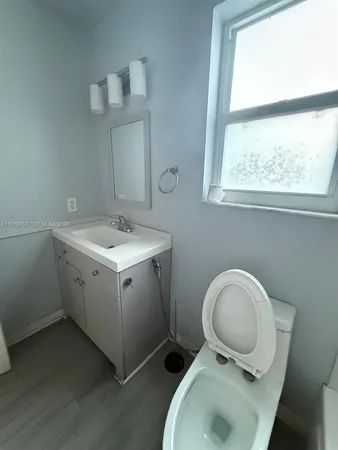 a utility room with a window dryer and washer