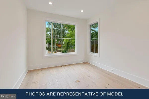 a view interior of a house with wooden floor windows and a chandelier
