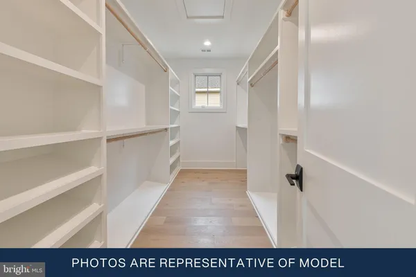 an empty room with large window