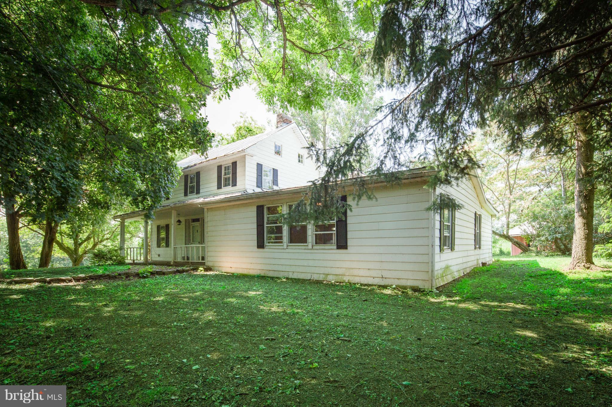 10537 Green Valley Road Union Bridge, MD 21791 - Photo 2 of 30 front view of house with a yard