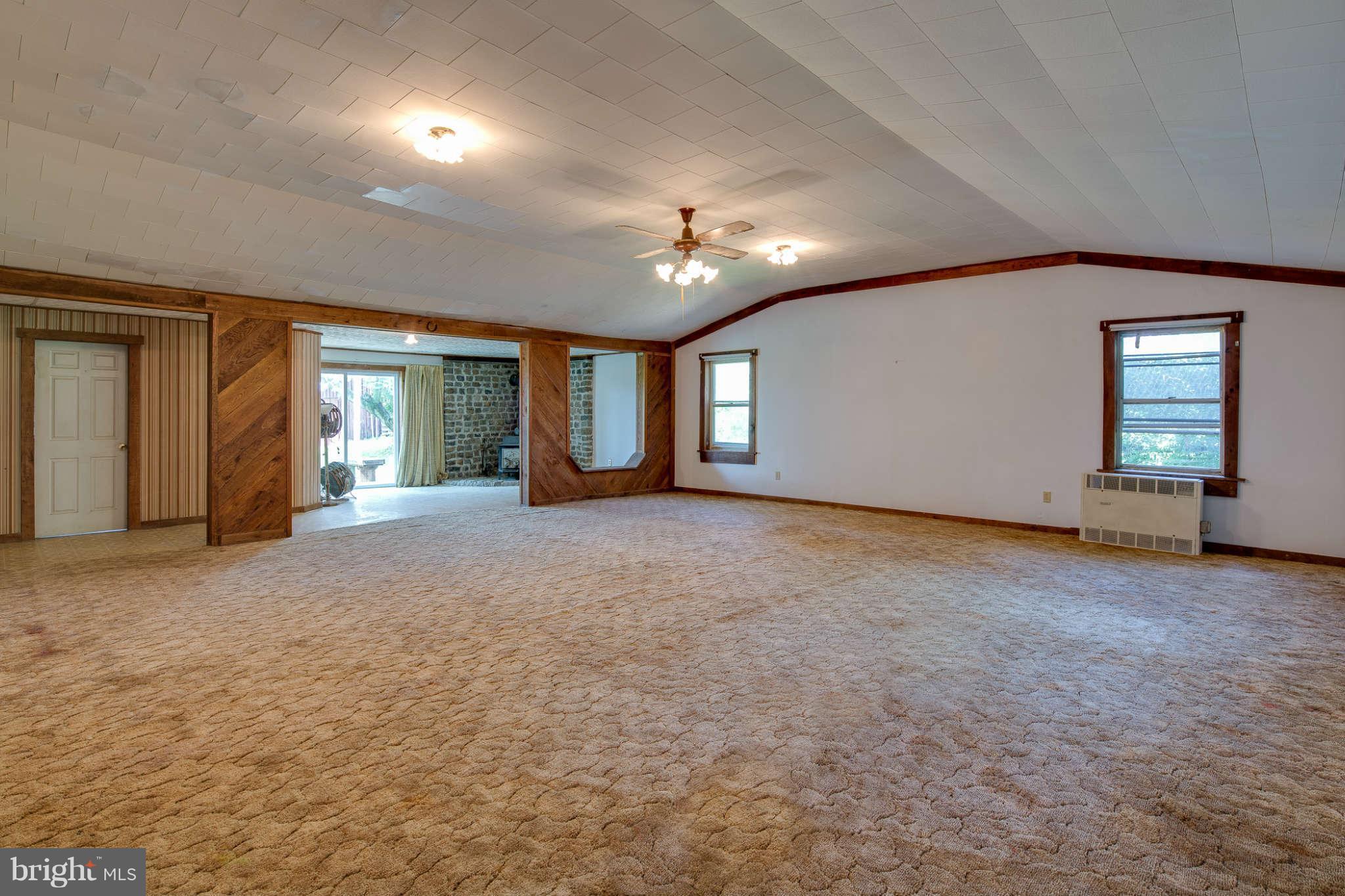 10537 Green Valley Road Union Bridge, MD 21791 - Photo 16 of 30 a view of a livingroom with a staircase