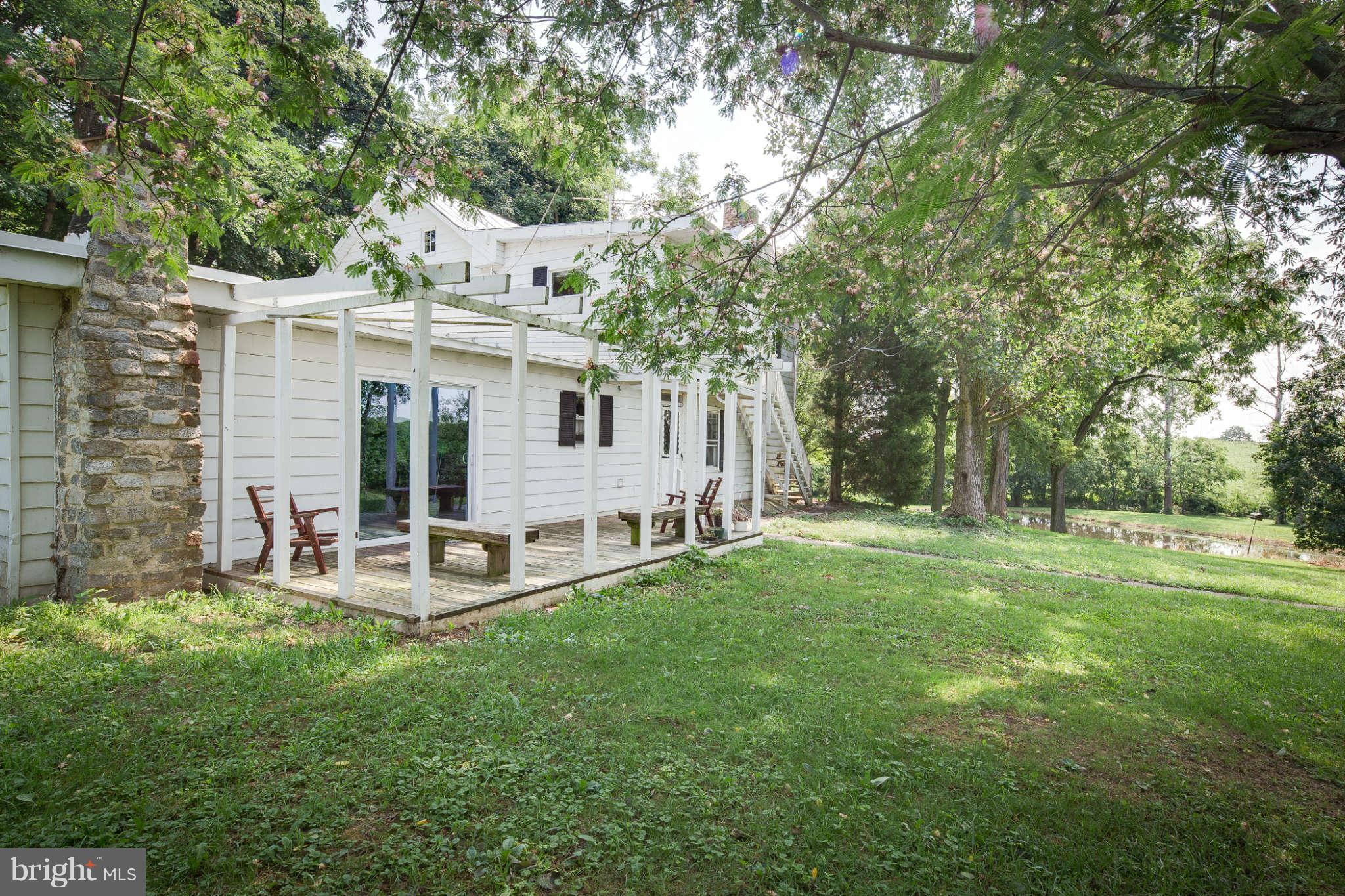 10537 Green Valley Road Union Bridge, MD 21791 - Photo 27 of 30 a view of a house with backyard and sitting area