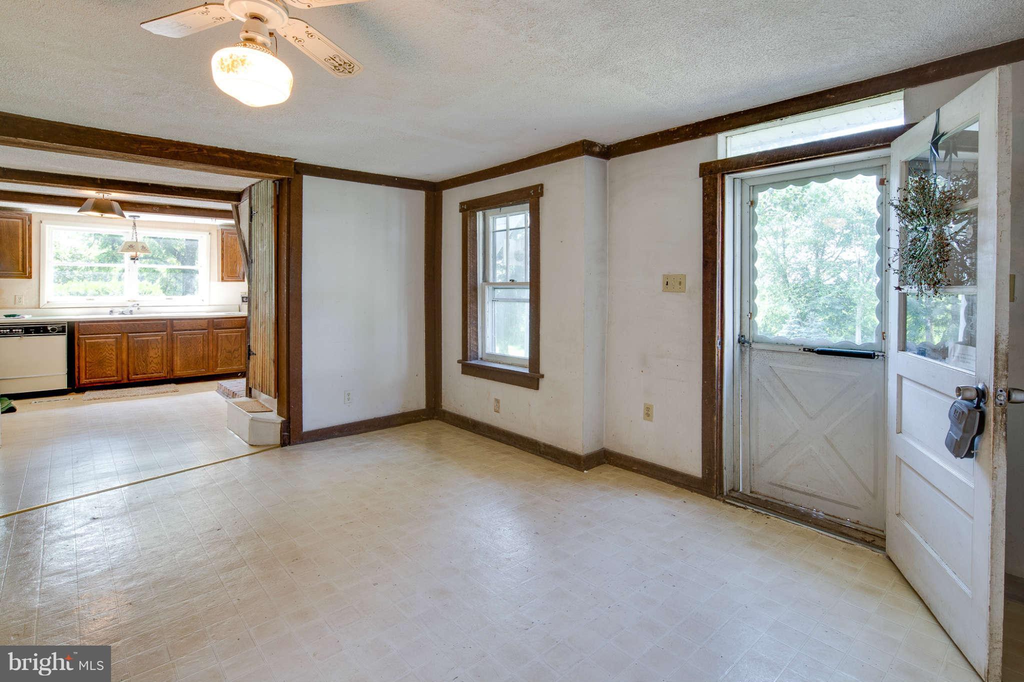 10537 Green Valley Road Union Bridge, MD 21791 - Photo 4 of 30 a view of an empty room with a window