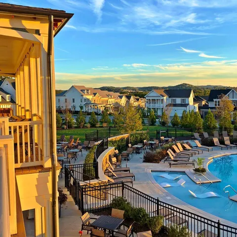 an aerial view of a house with a garden