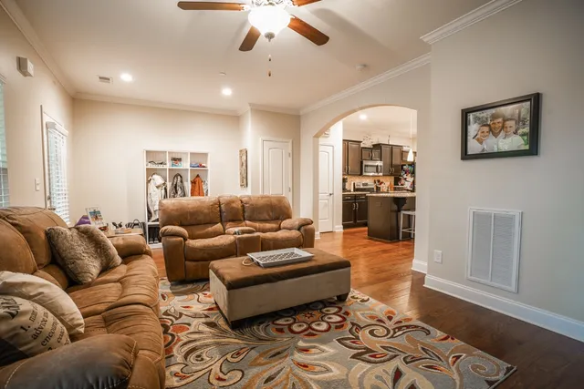 a kitchen with stainless steel appliances granite countertop a stove and a refrigerator