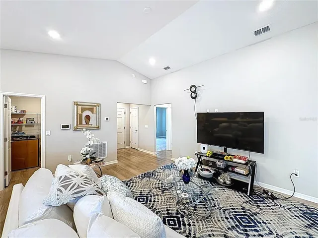 a kitchen with a dining table and chairs