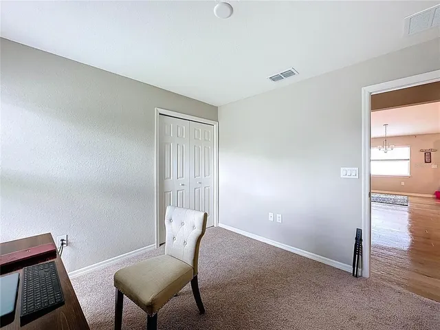 a view of a room with a window