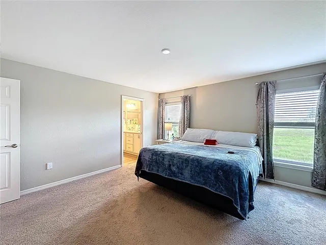 a view of a back yard from a balcony