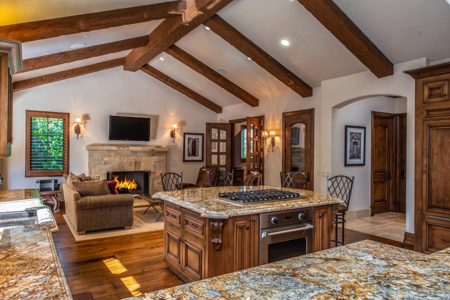 1010 Ocean Road Pebble Beach, CA 93953 - Photo 7 of 32 a kitchen with a stove and a refrigerator