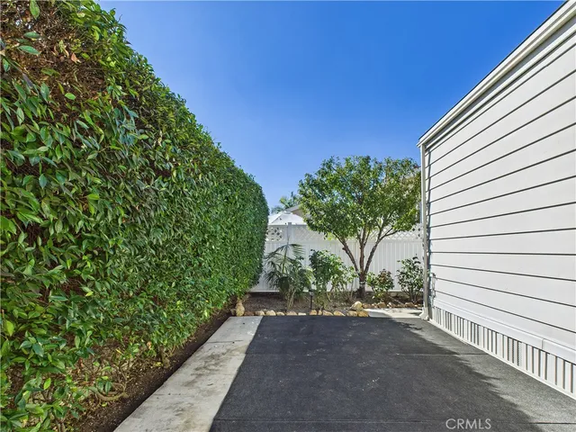 a view of a back yard of a house