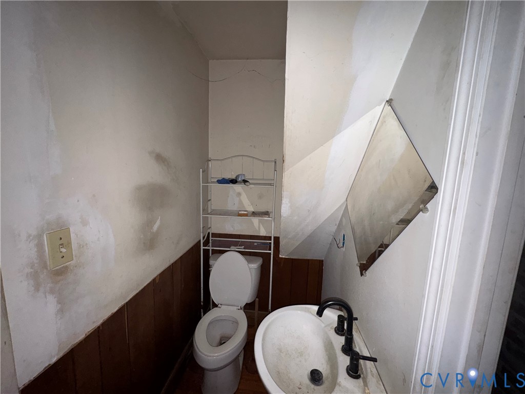 303 Purdy Road Emporia, VA 23847 - Photo 12 of 18 a bathroom with a toilet and a sink