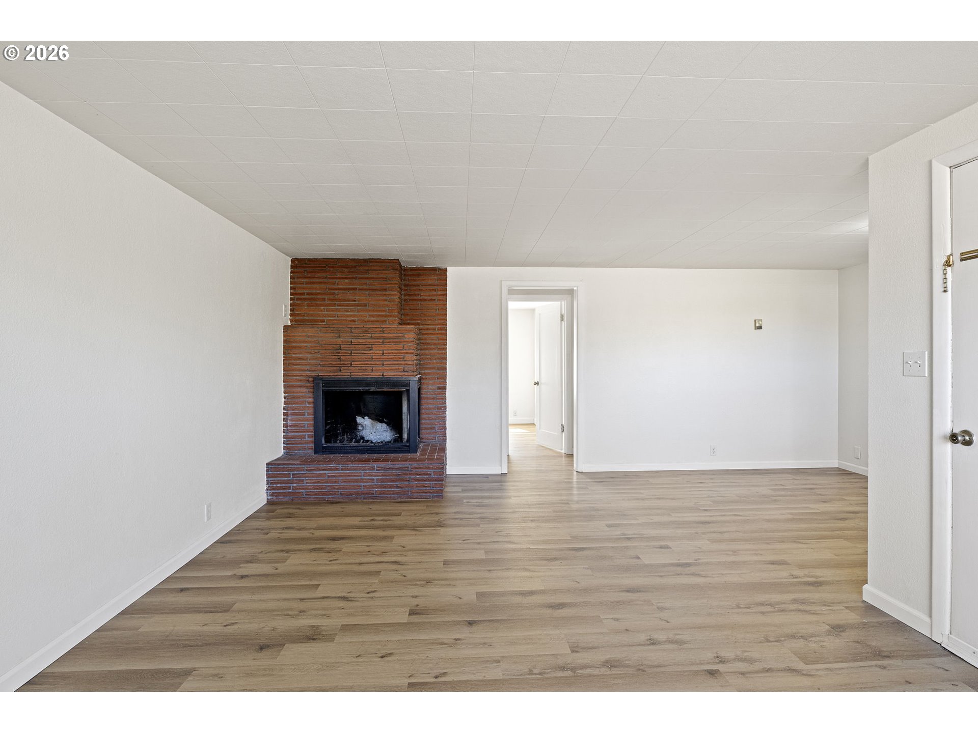 1008 Coburg Road Eugene, OR 97401 - Photo 30 of 46 a view of an empty room and wooden floor