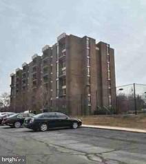 9900 Georgia Avenue, Unit 27203 Silver Spring, MD 20902 - Photo 2 of 3 a car parked in front of a building