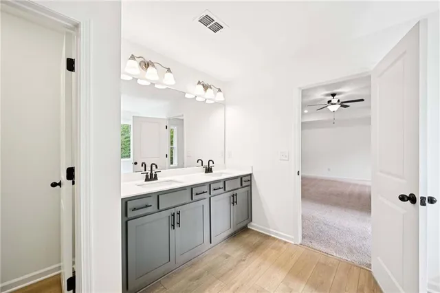 a white bath tub sitting next to a window