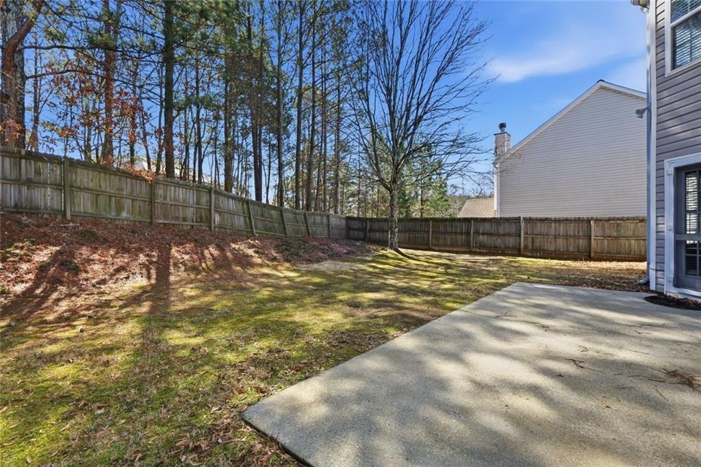 3570 Bogan Mill Road Northeast Buford, GA 30519 - Photo 30 of 31 a view of back yard of the house