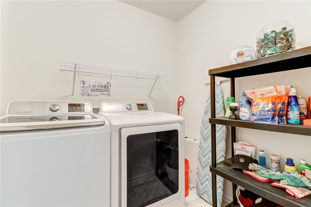 45170 Dutton Way Callahan, FL 32011 - Photo 25 of 35 a utility room with dryer and washer