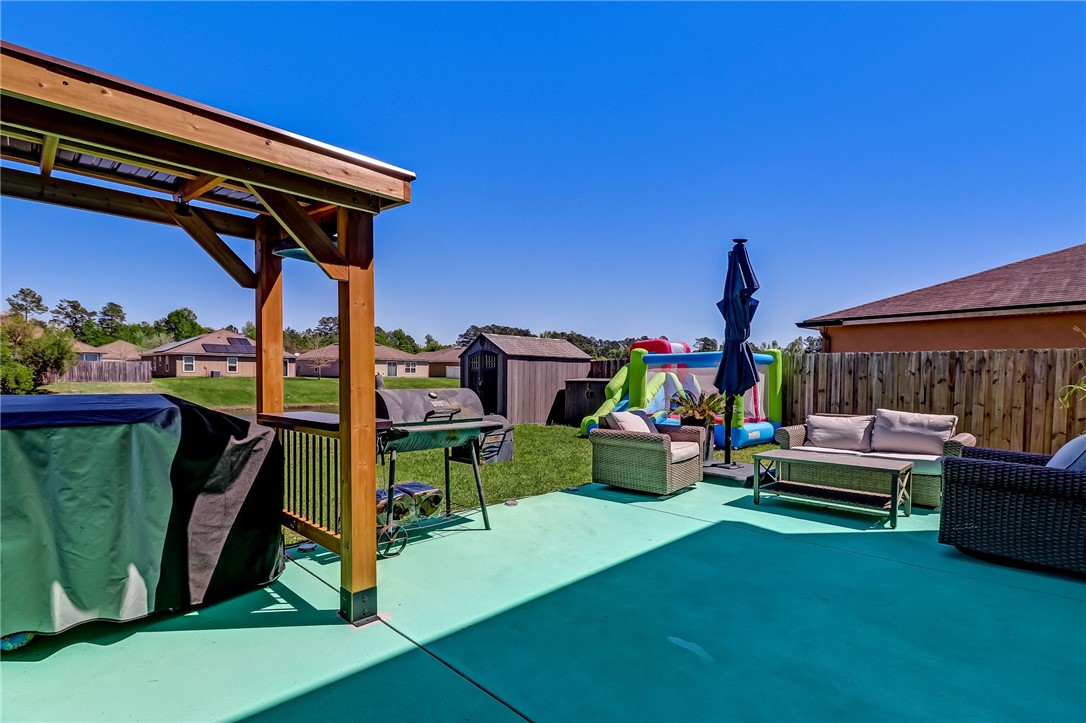 45170 Dutton Way Callahan, FL 32011 - Photo 28 of 35 a view of an outdoor sitting area