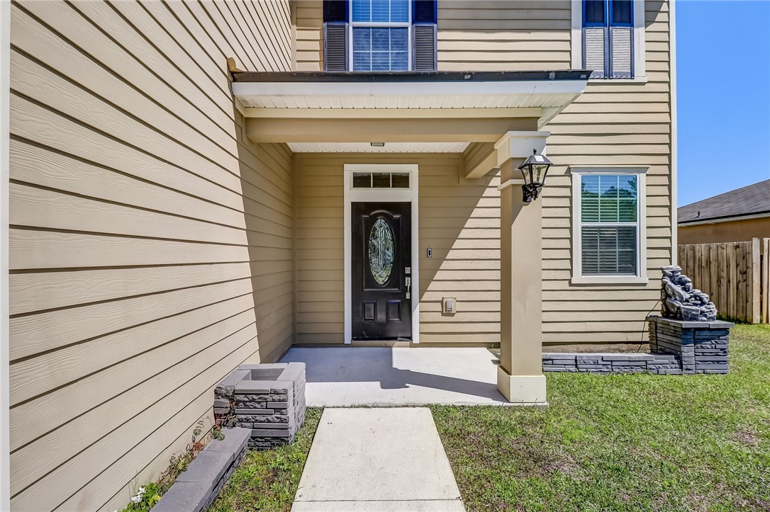 45170 Dutton Way Callahan, FL 32011 - Photo 3 of 35 a view of a house with a white door