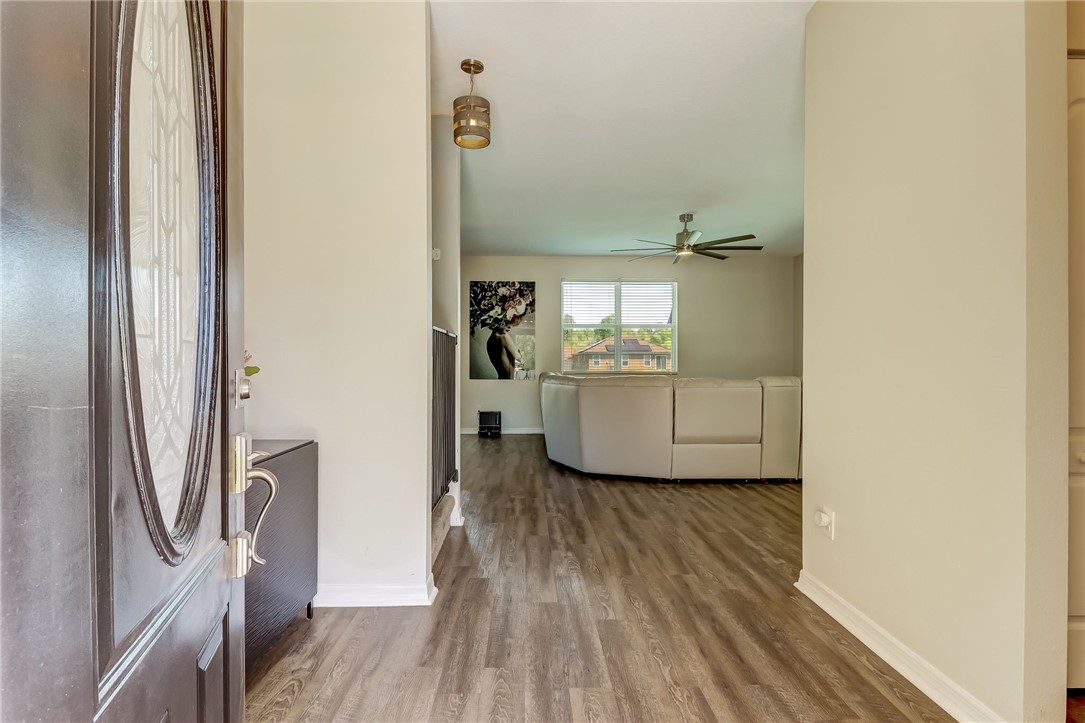 45170 Dutton Way Callahan, FL 32011 - Photo 4 of 35 a room with a sink and wooden floor