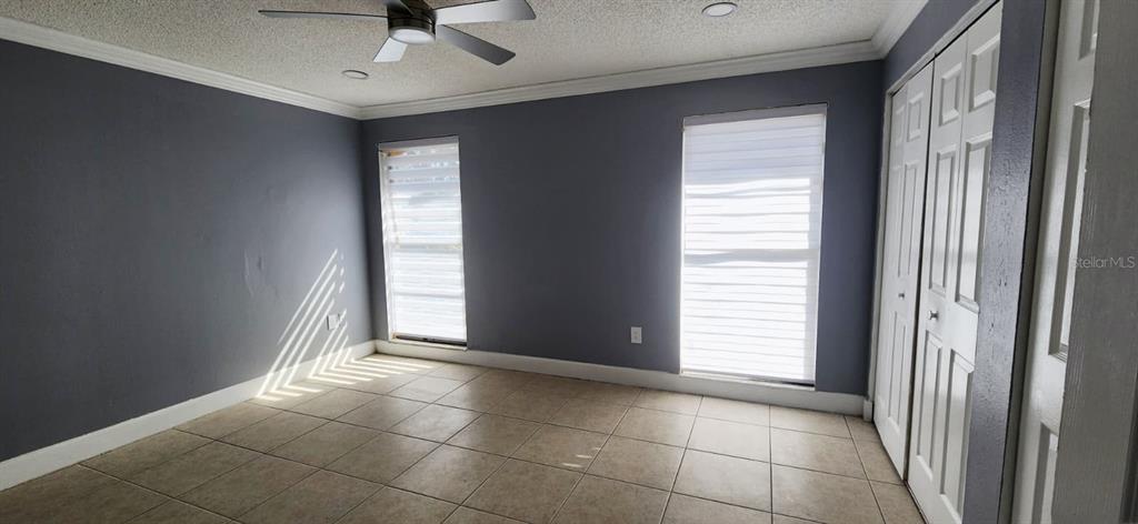 7118 Jenner Avenue New Port Richey, FL 34655 - Photo 4 of 12 a view of an empty room with a window