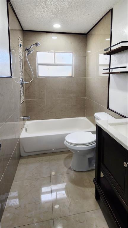 7118 Jenner Avenue New Port Richey, FL 34655 - Photo 10 of 12 a bathroom with a toilet a sink and bathtub