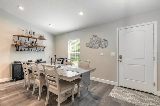 a view of a dining room with furniture