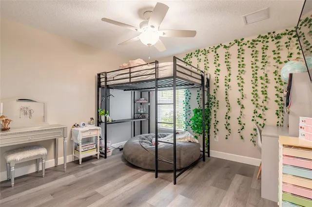 a view of a livingroom with furniture and a chandelier