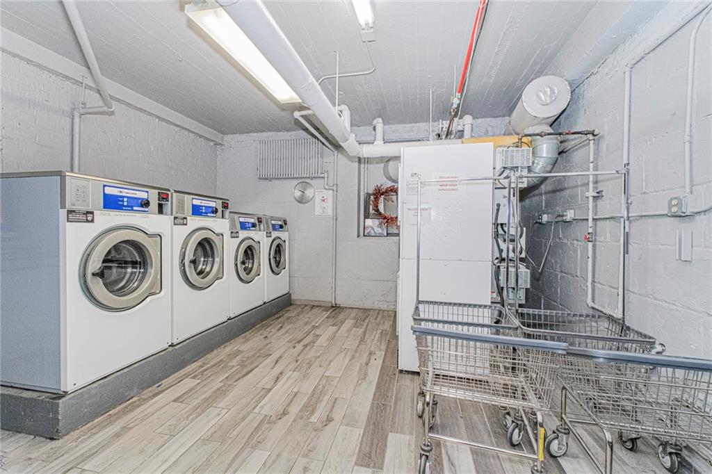 20 89th Street, Unit 3A Brooklyn, NY 11209 - Photo 15 of 18 a utility room with dryer and washer