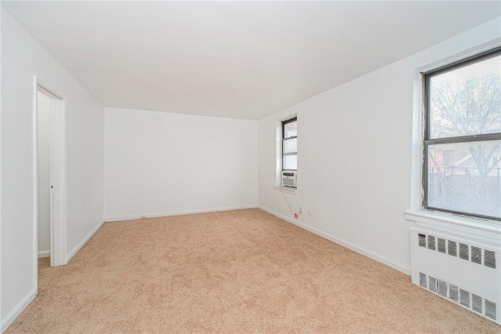 20 89th Street, Unit 3A Brooklyn, NY 11209 - Photo 3 of 18 an empty room with windows