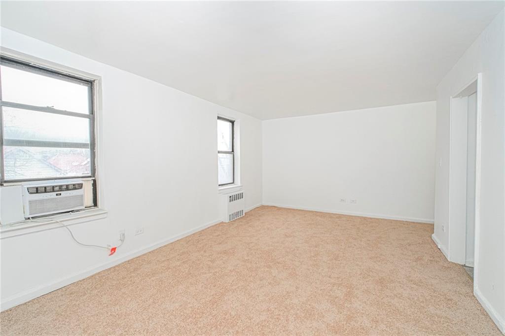 20 89th Street, Unit 3A Brooklyn, NY 11209 - Photo 4 of 18 an empty room with windows