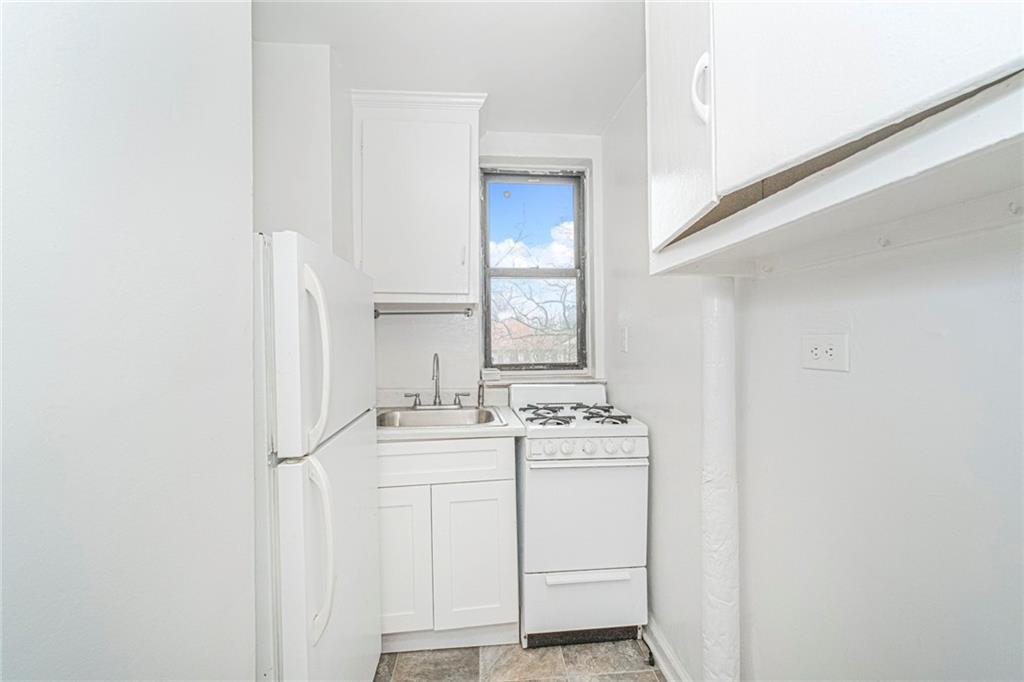 20 89th Street, Unit 3A Brooklyn, NY 11209 - Photo 6 of 18 a utility room with dryer and washer