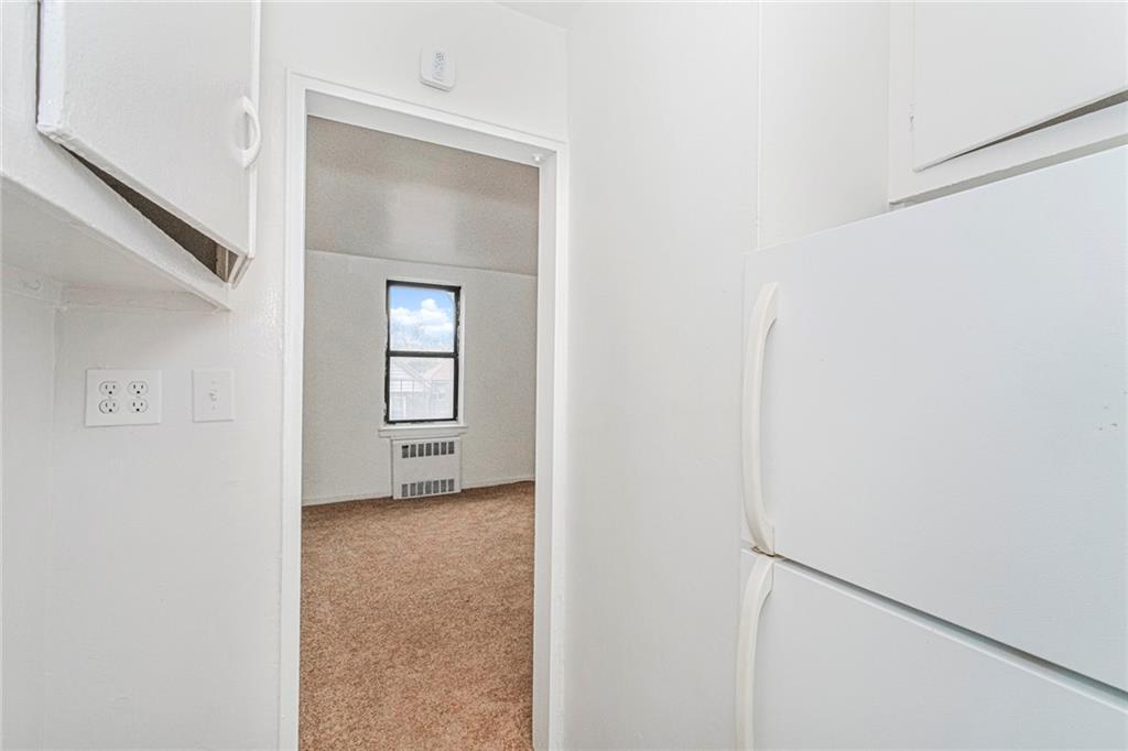 20 89th Street, Unit 3A Brooklyn, NY 11209 - Photo 7 of 18 a view of an empty room with closet and a window