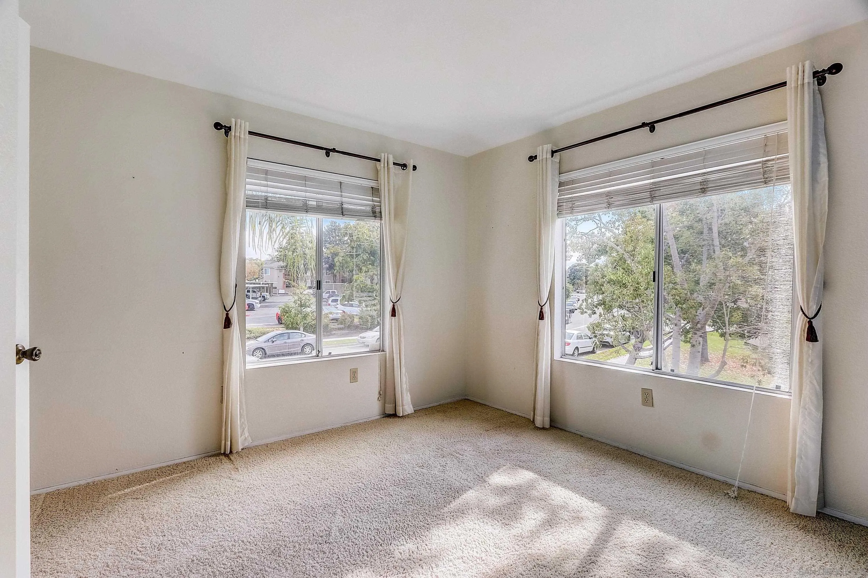 405 Ribbon Beach Way, Unit 249 Oceanside, CA 92058 - Photo 11 of 34 a big room with windows and closet