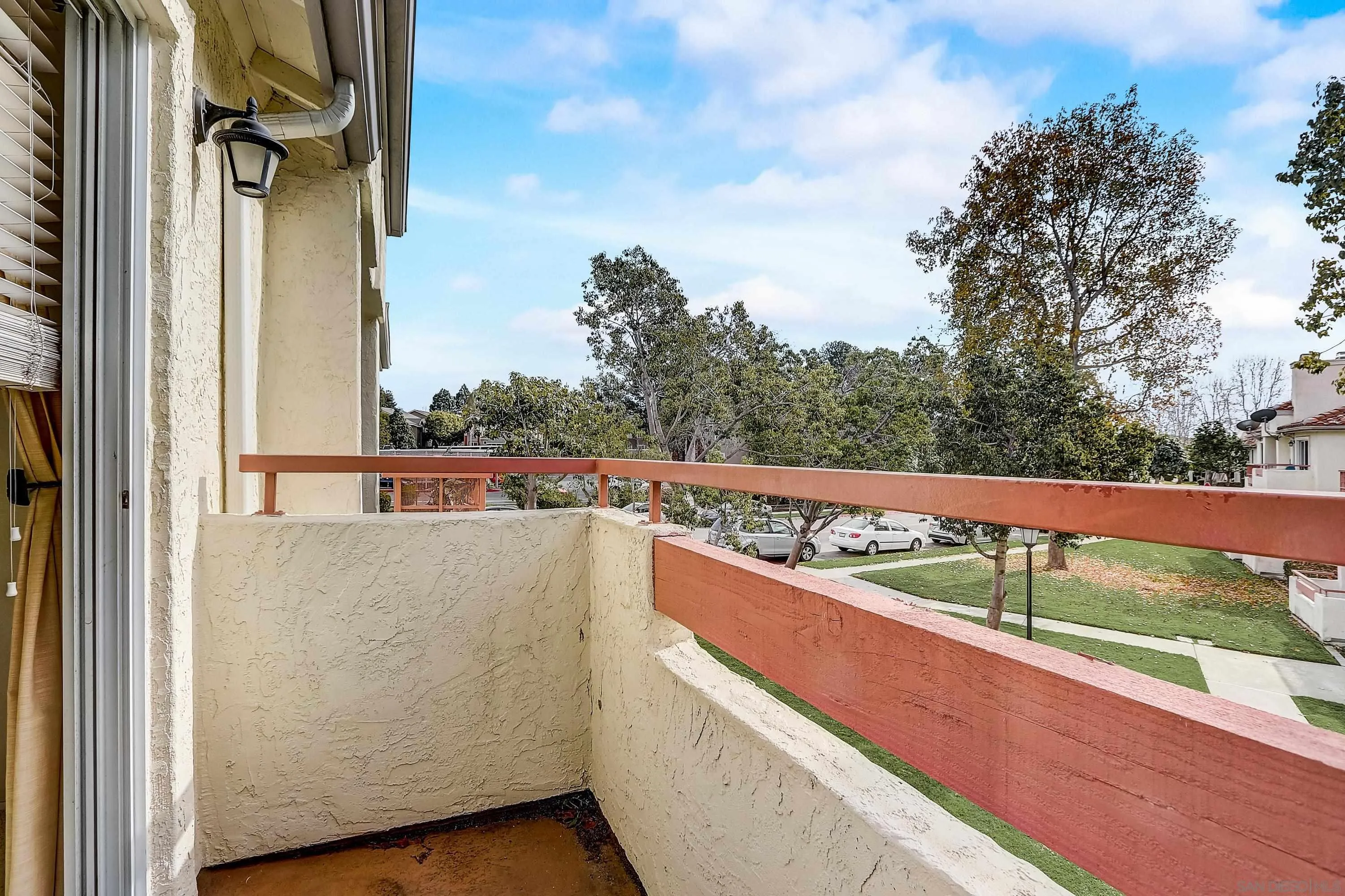 405 Ribbon Beach Way, Unit 249 Oceanside, CA 92058 - Photo 20 of 34 a view of a balcony with an outdoor space