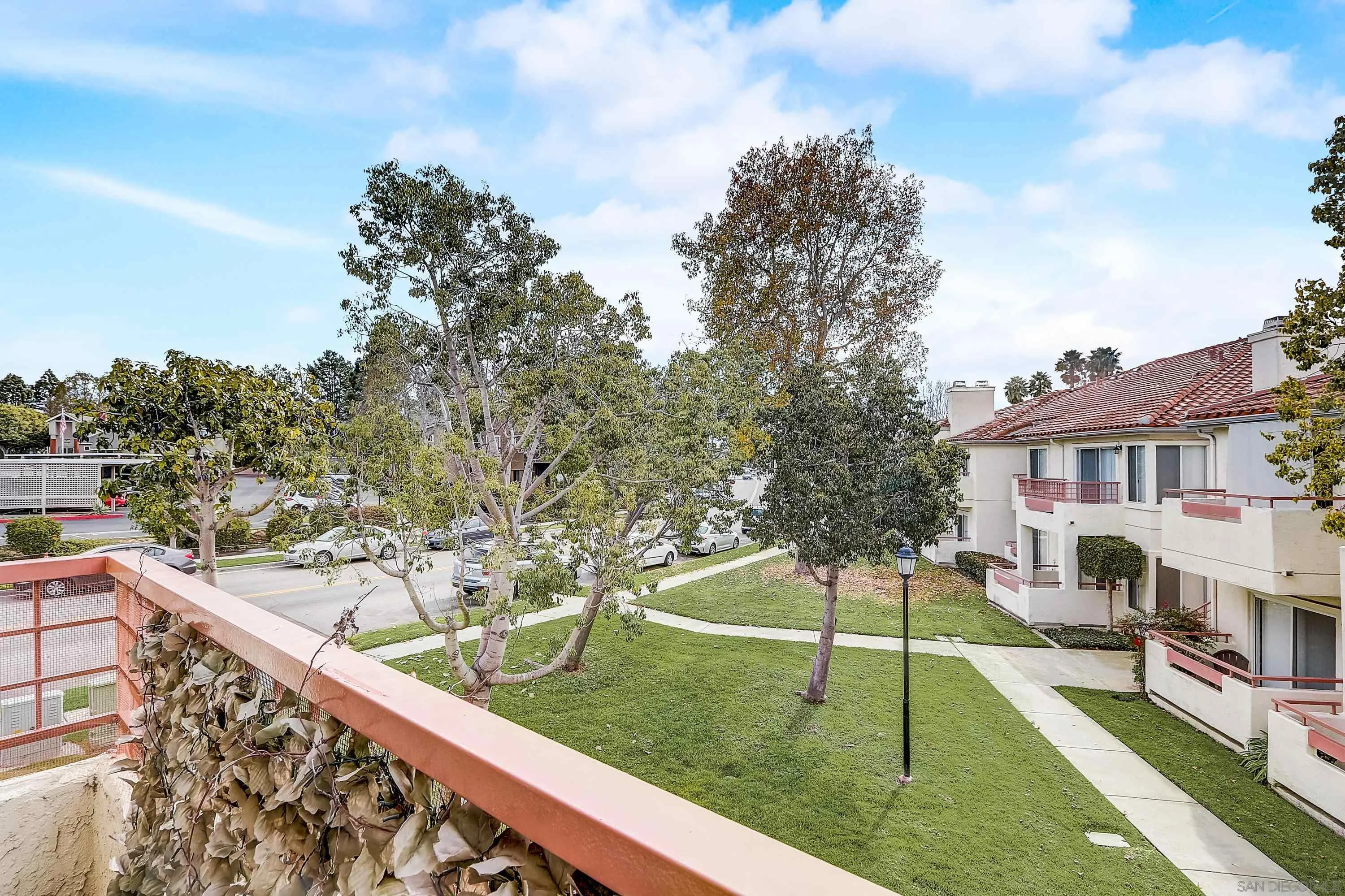 405 Ribbon Beach Way, Unit 249 Oceanside, CA 92058 - Photo 21 of 34 a view of a patio with a yard