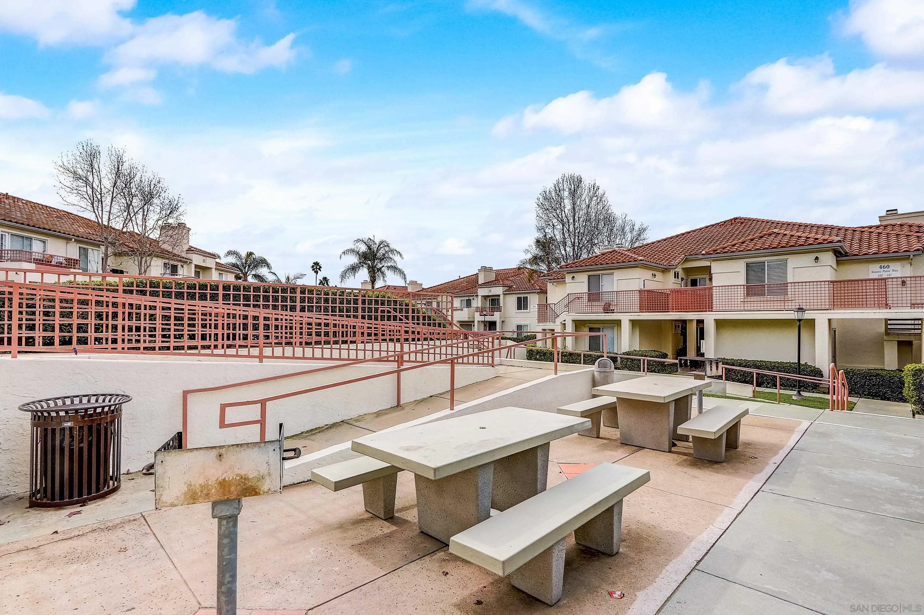 405 Ribbon Beach Way, Unit 249 Oceanside, CA 92058 - Photo 29 of 34 a view of a patio with couches table and chairs