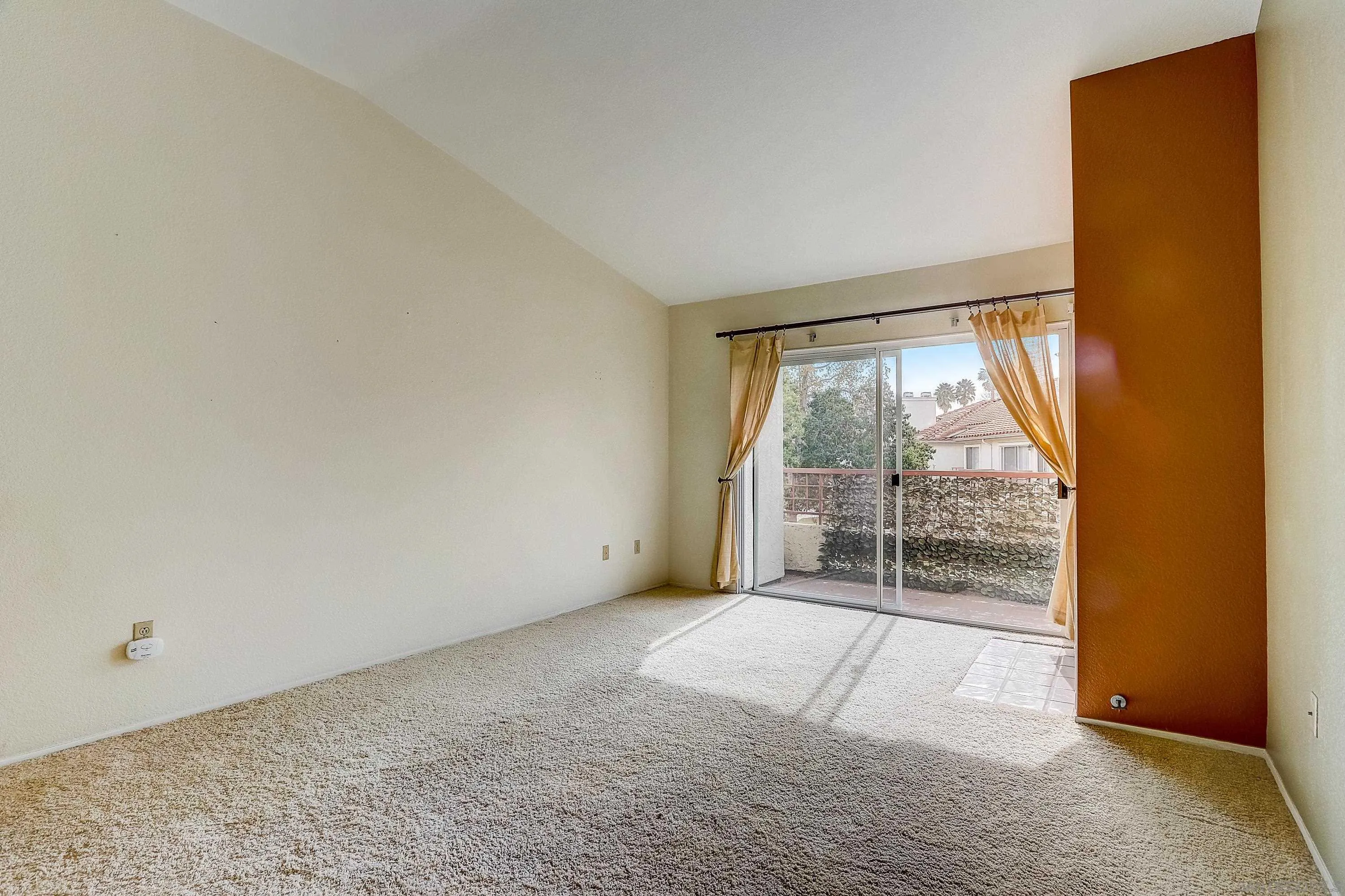 405 Ribbon Beach Way, Unit 249 Oceanside, CA 92058 - Photo 6 of 34 a view of an empty room with a window