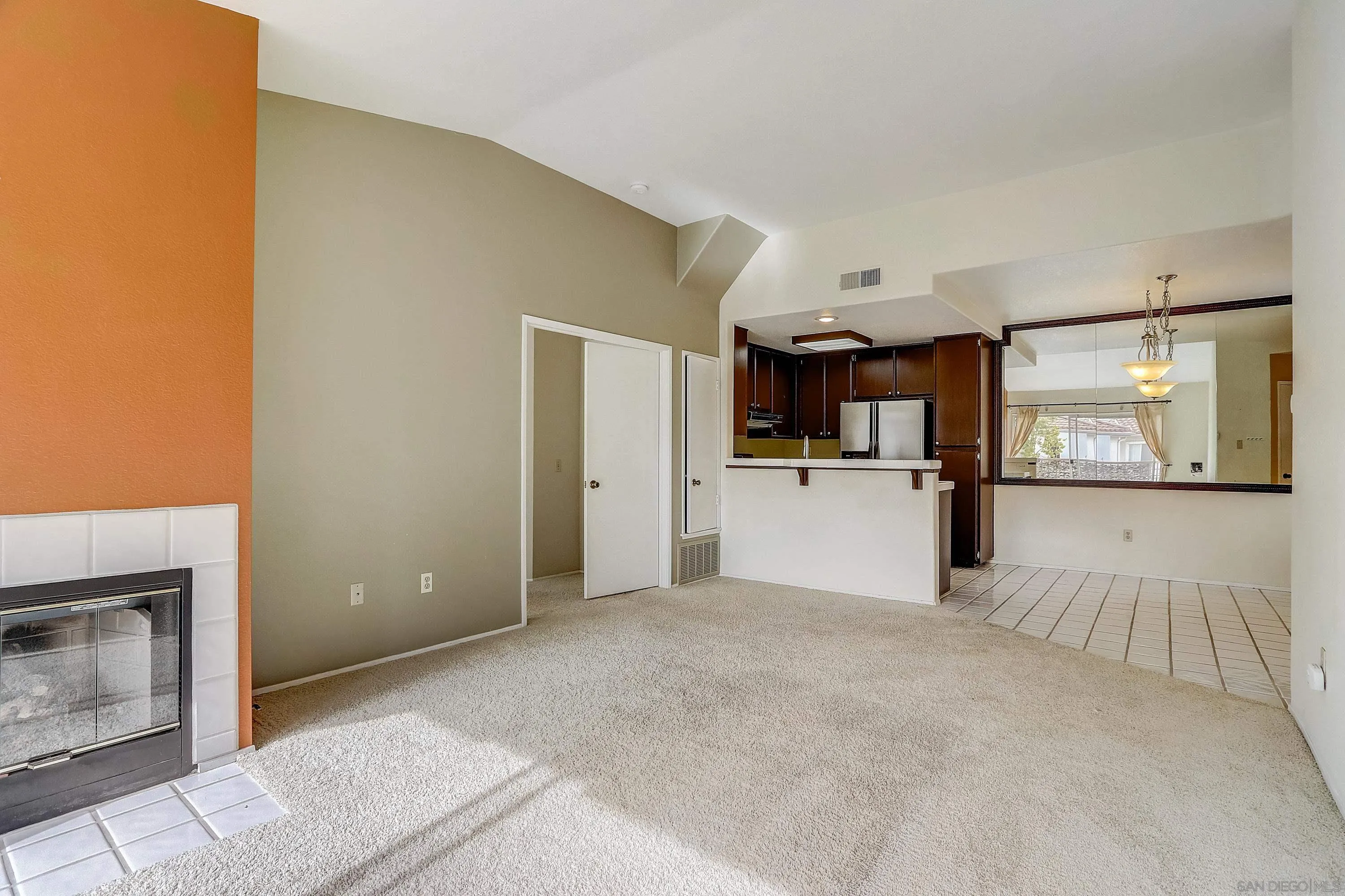 405 Ribbon Beach Way, Unit 249 Oceanside, CA 92058 - Photo 7 of 34 a view of a kitchen with furniture and wooden floor
