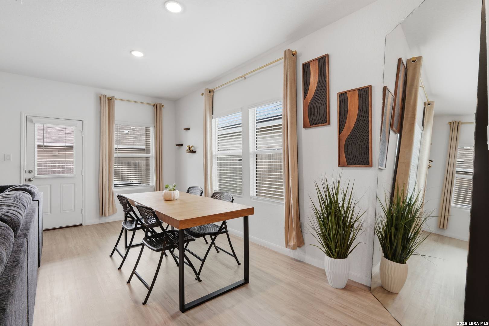 14919 Rhyolite Way Elmendorf, TX 78112 - Photo 11 of 26 a view of a livingroom with furniture and window